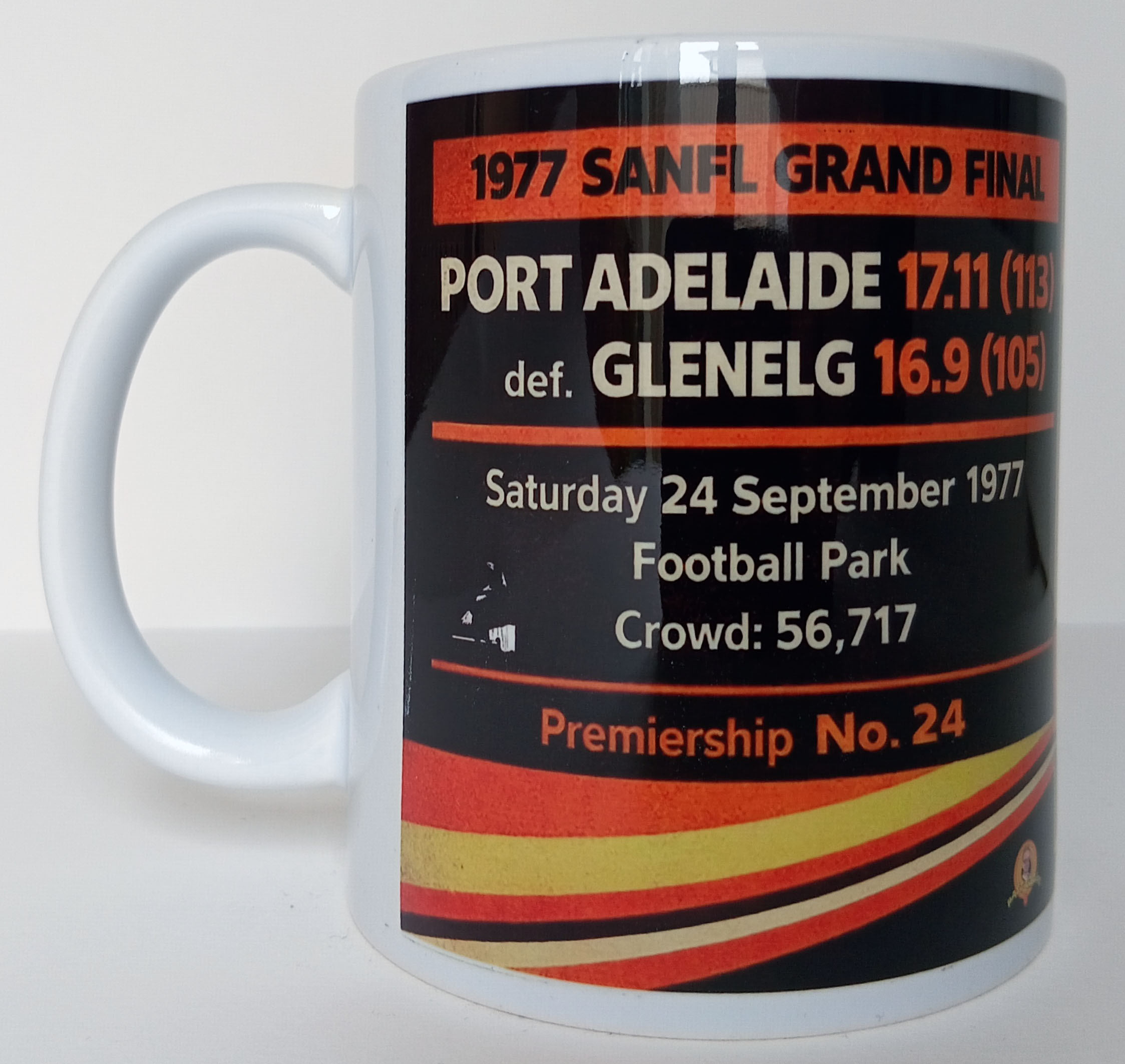 Port Adelaide 1977 Premiers Mug rear panel showing SANFL Grand Final score 17.11 (113) def Glenelg 16.9 (105) at Football Park, crowd 56,717